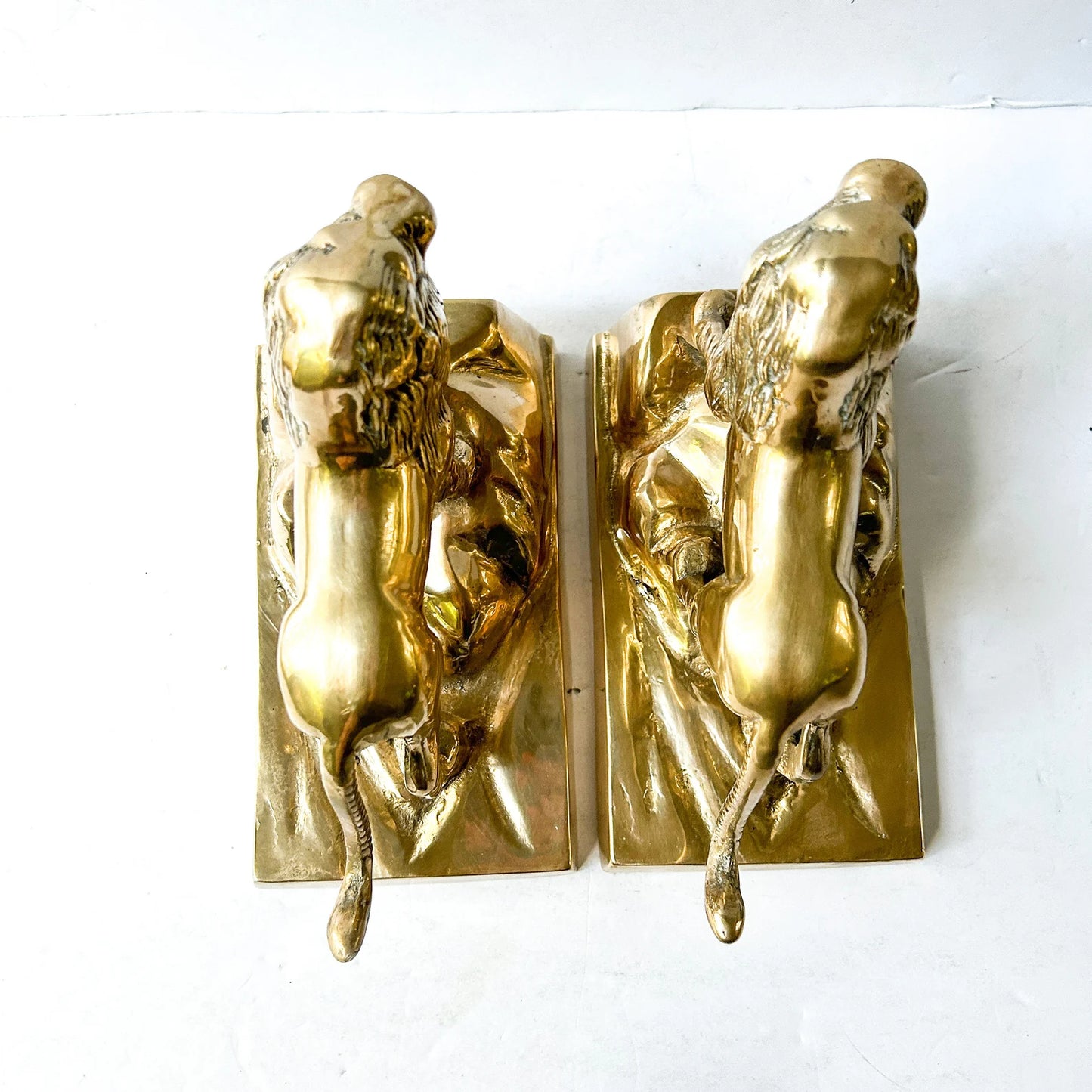 Vintage brass lion bookends