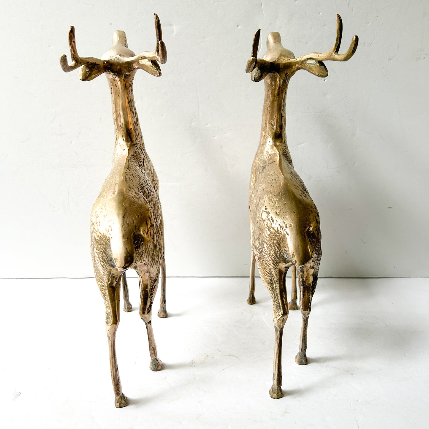 Vintage large brass reindeer pair