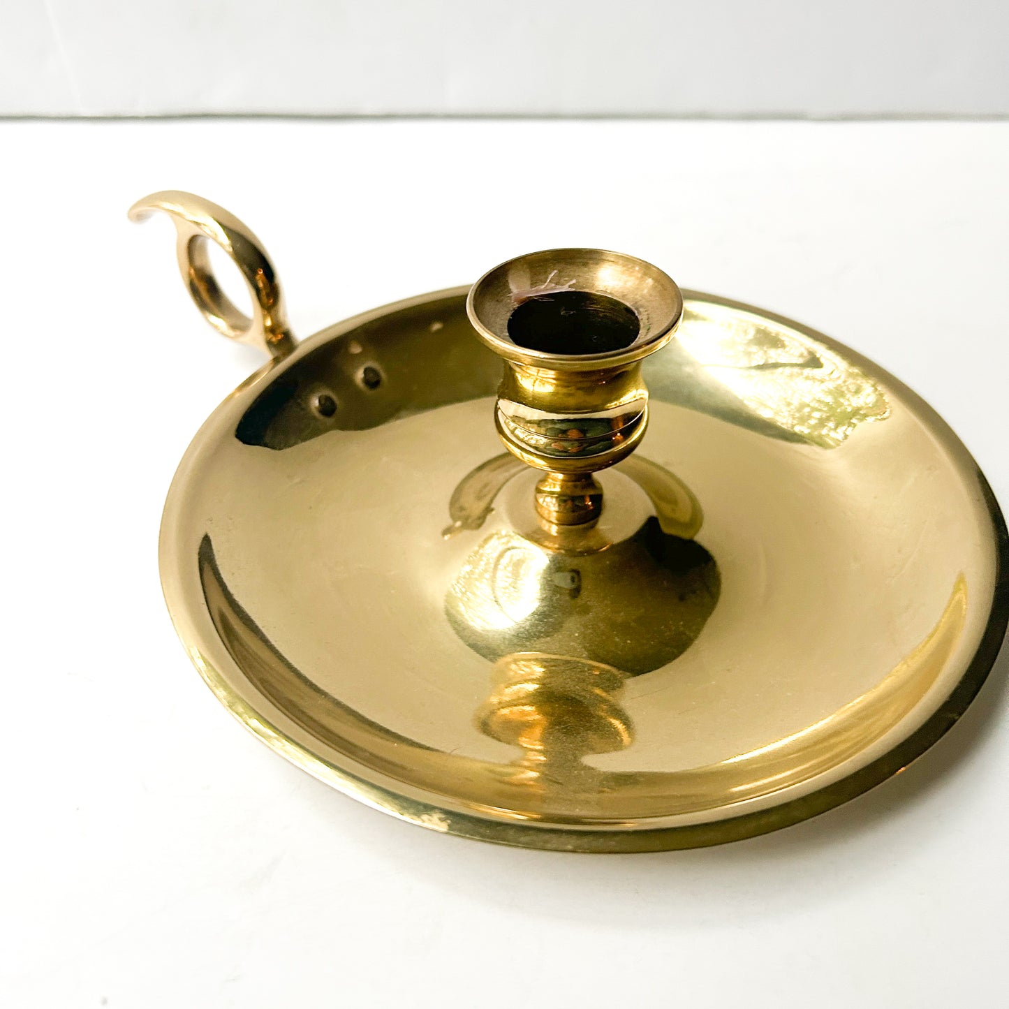 Vintage brass chamber candle with loop finger holder