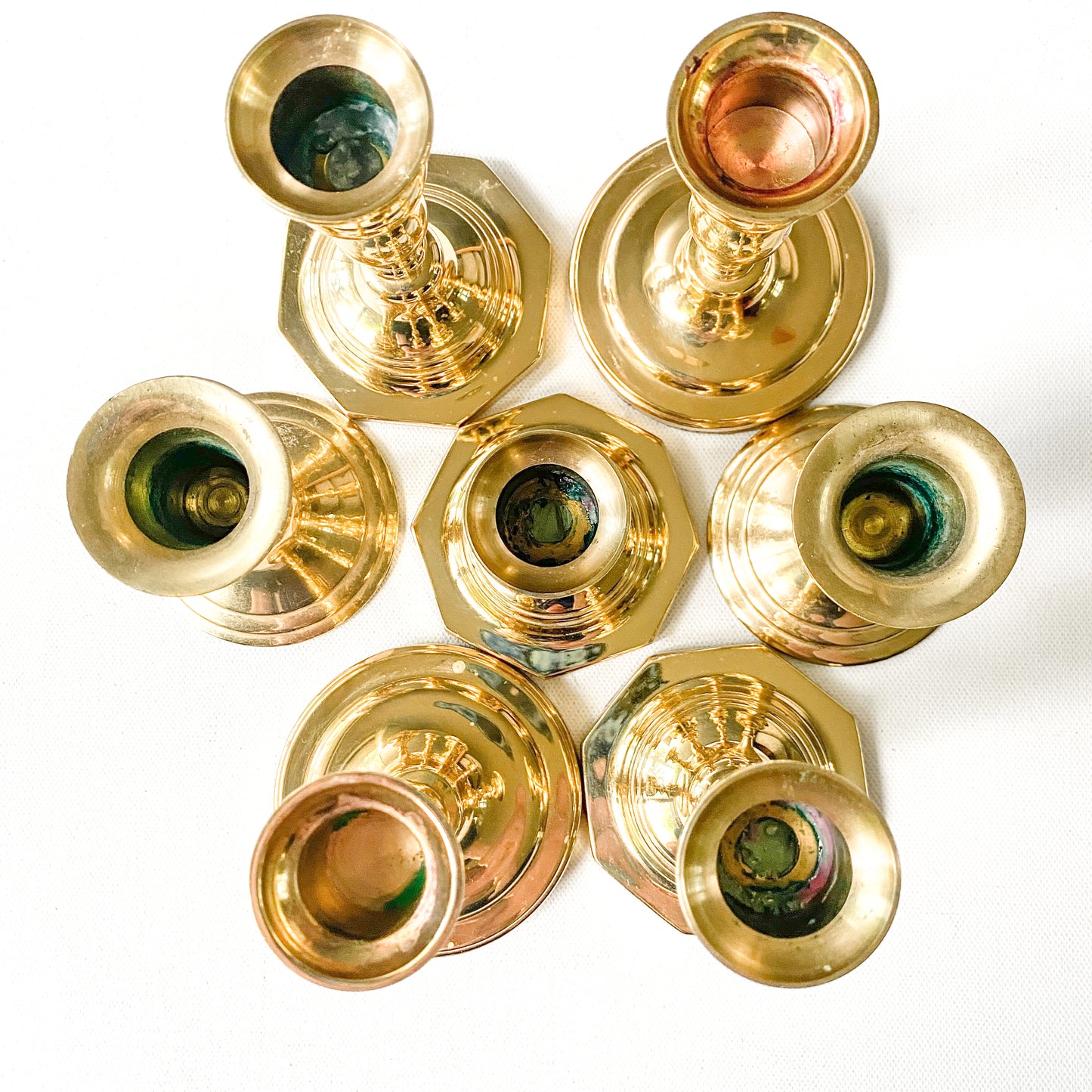 Assorted vintage brass candle holder collection, set of 7