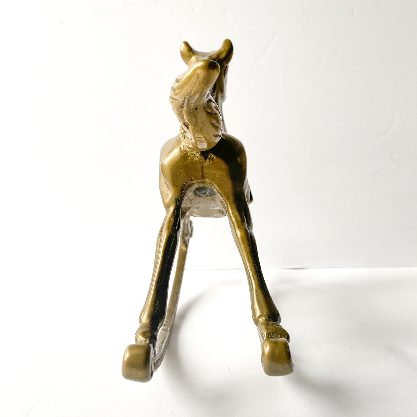 Vintage brass rocking horse sculpture
