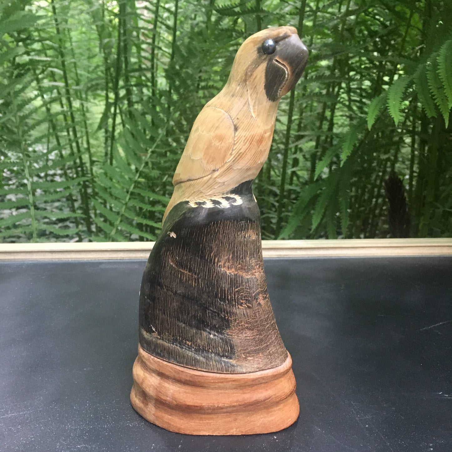Hand carved buffalo horn vintage parrot