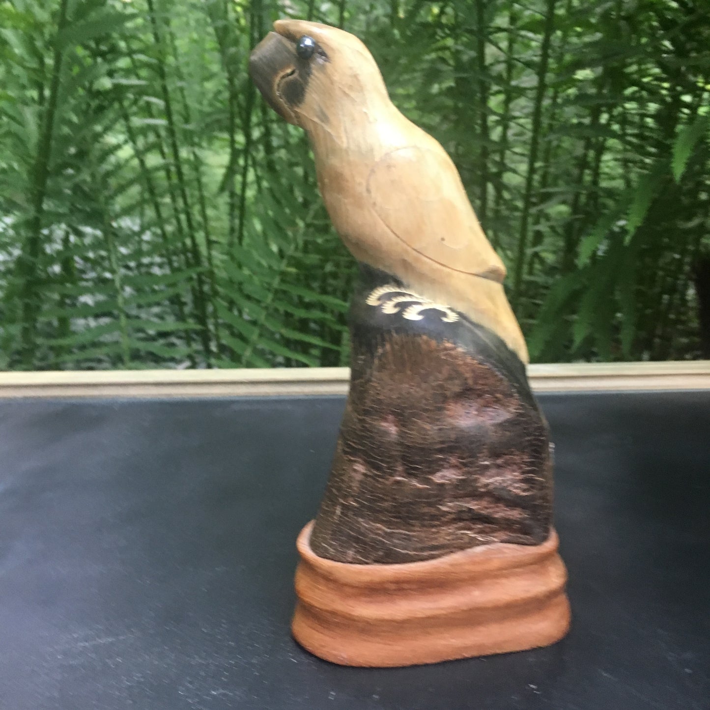 Hand carved buffalo horn vintage parrot
