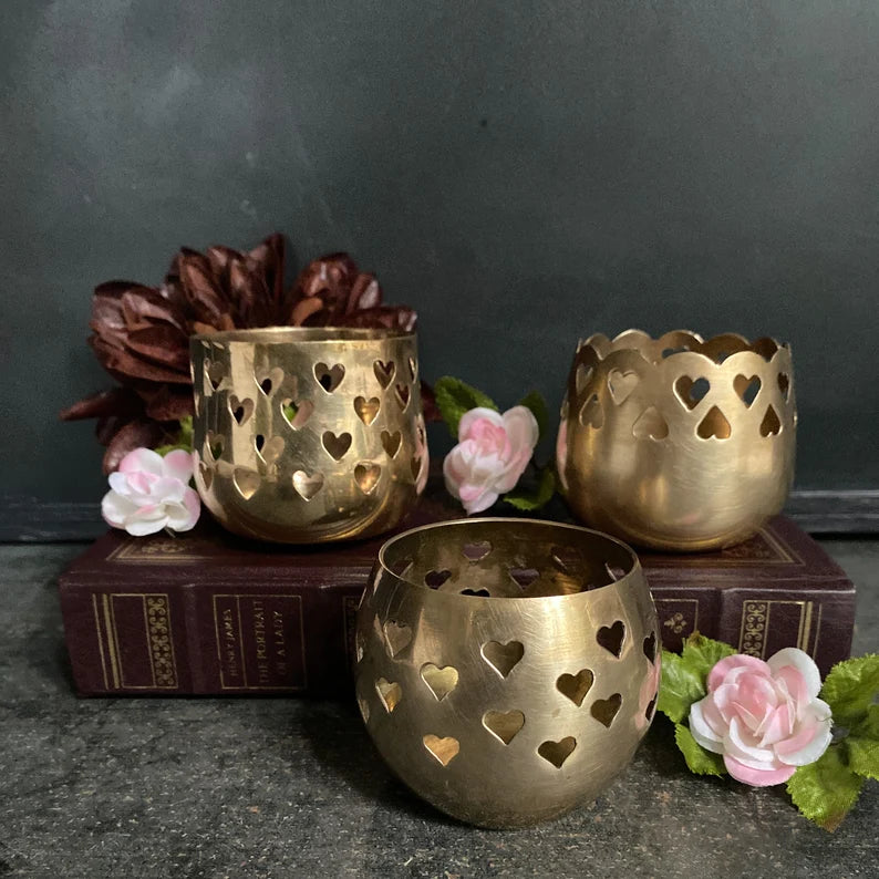 Three vintage brass hearts votive candle holders