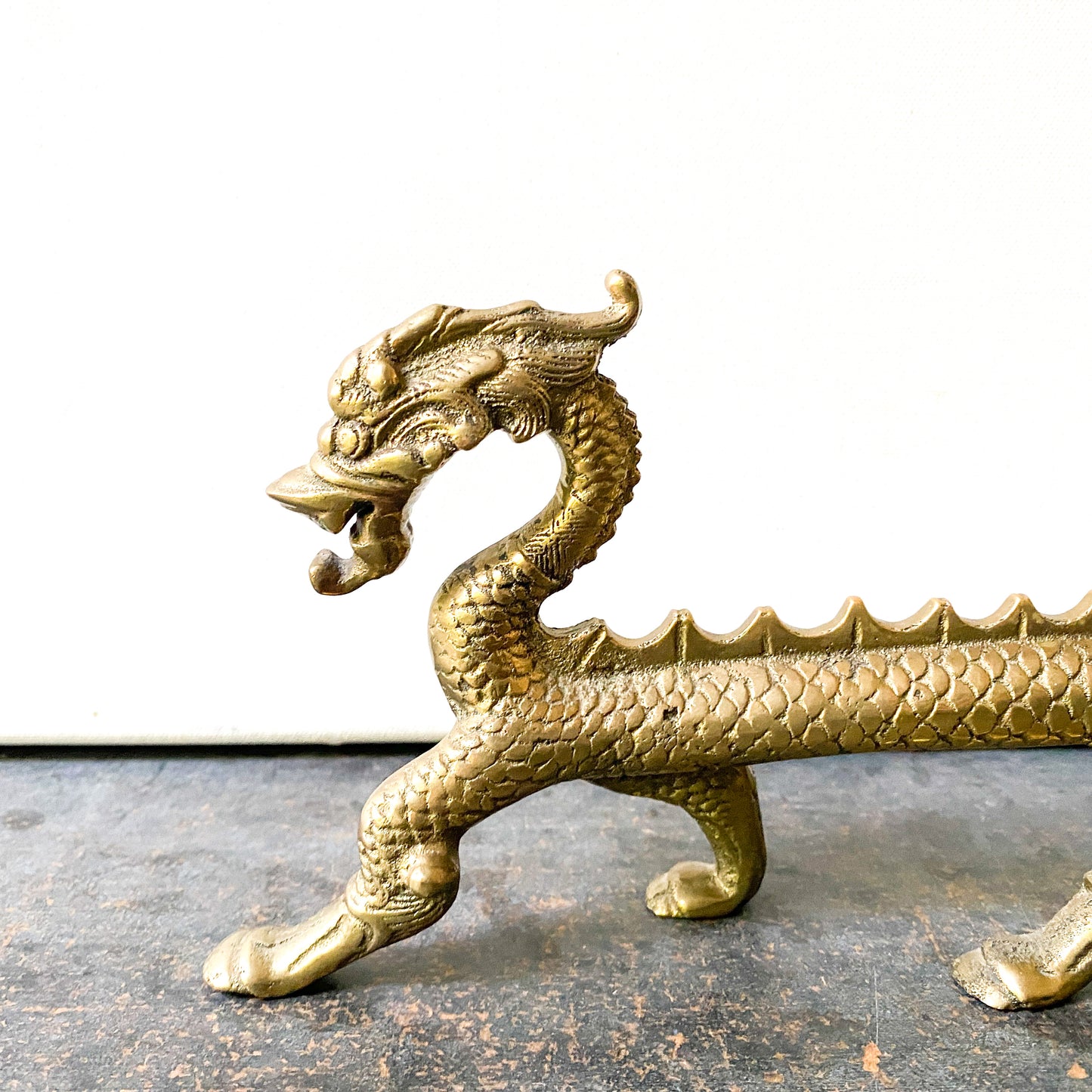 Long, vintage brass dragon