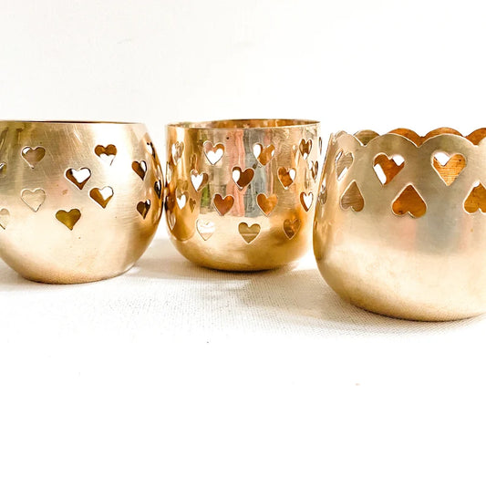 Three vintage brass hearts votive candle holders