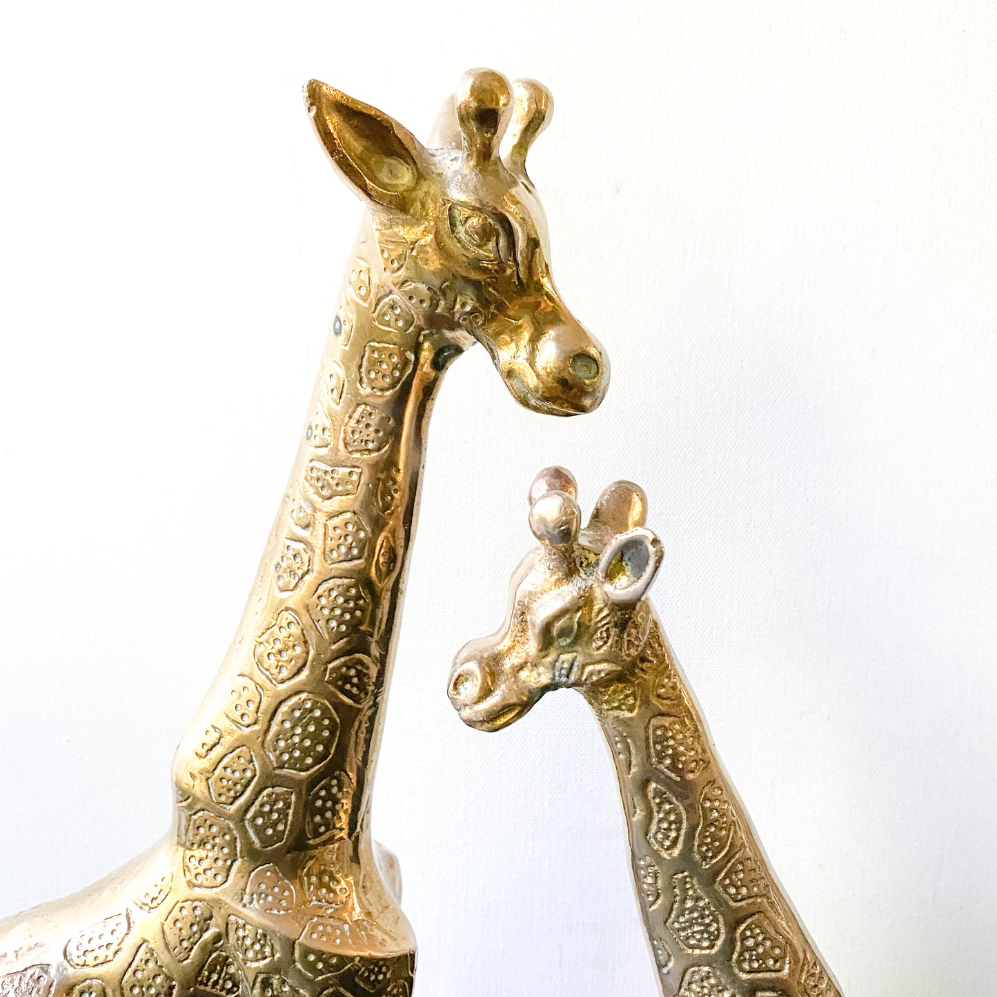 Large vintage brass giraffe sculptures