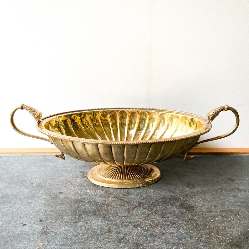 Vintage brass pedestal bowl with serpent handles