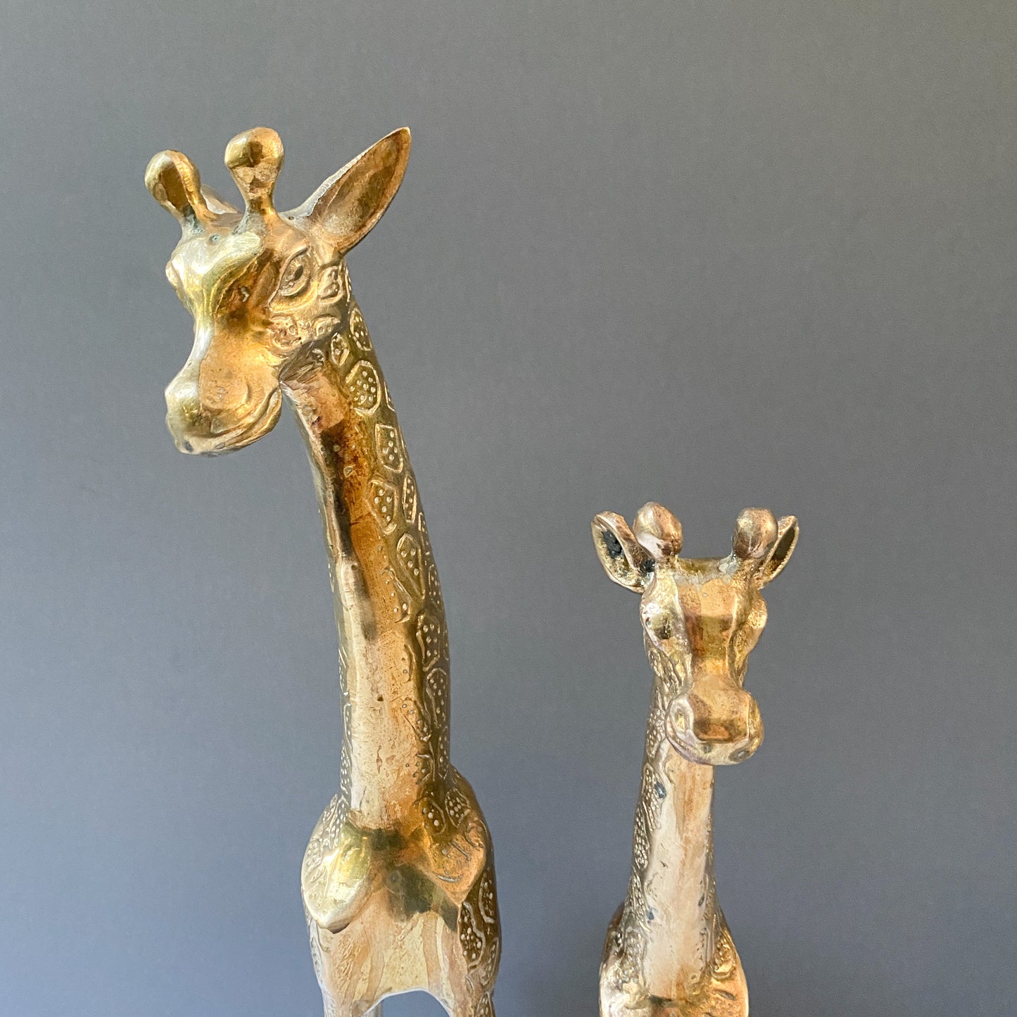 Large vintage brass giraffe sculptures