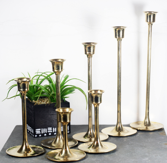 Set of Seven Graduated Brass Candlesticks